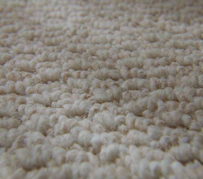close up of low pile berber white carpet